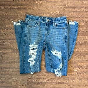 AMERICAN EAGLE - NEXT LEVEL STRETCH BLUE RIPPED SKINNY JEANS SIZE 4